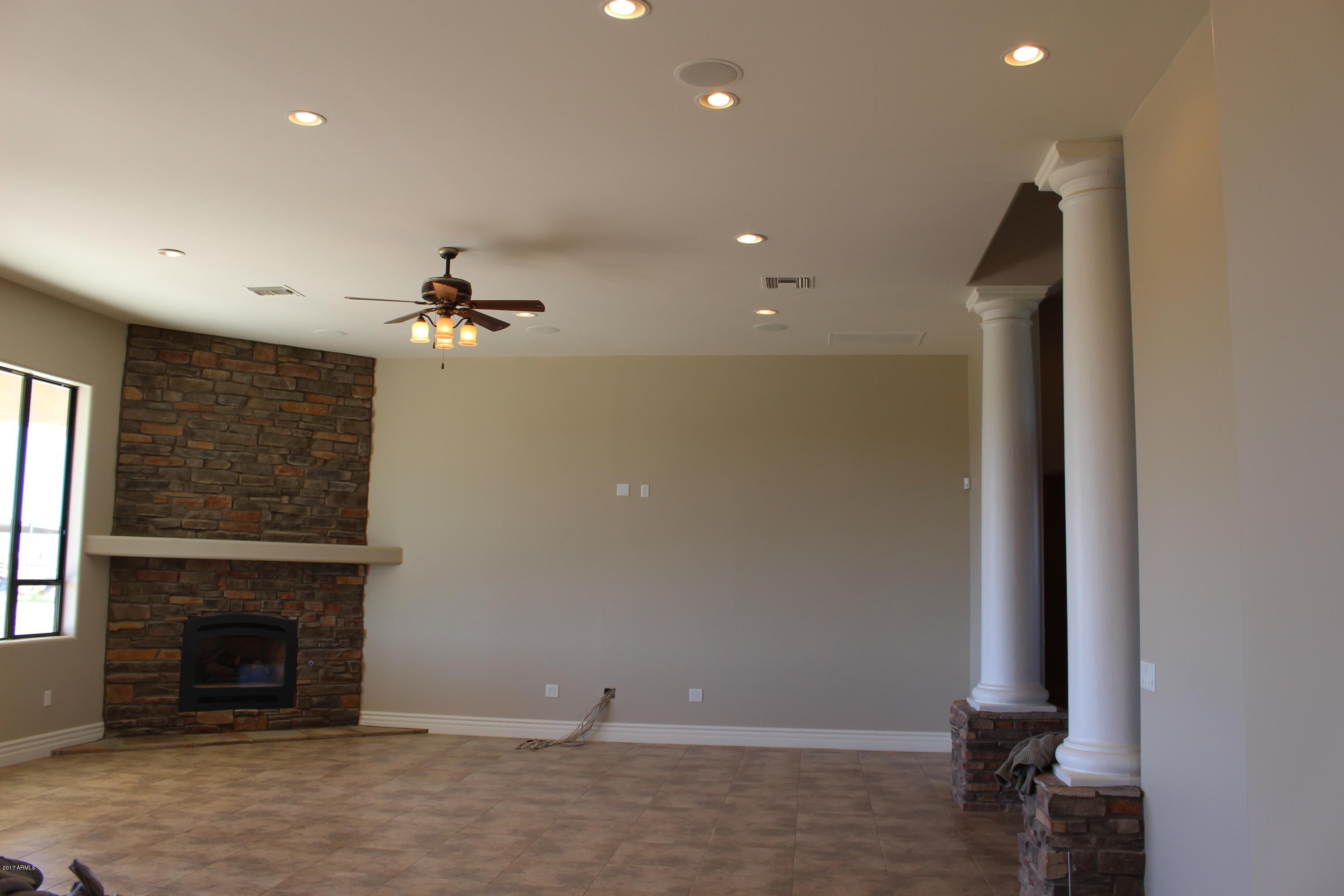 29981 West Marsh Road Casa Grande, AZ 85193 - Photo 10 of 38 Family room with fireplac