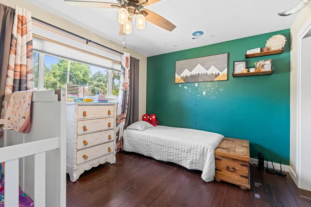 a room with a bed and a window