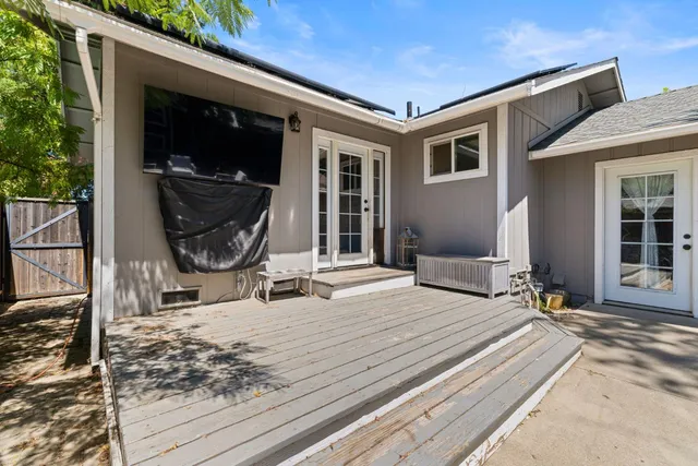 a house view with a backyard space