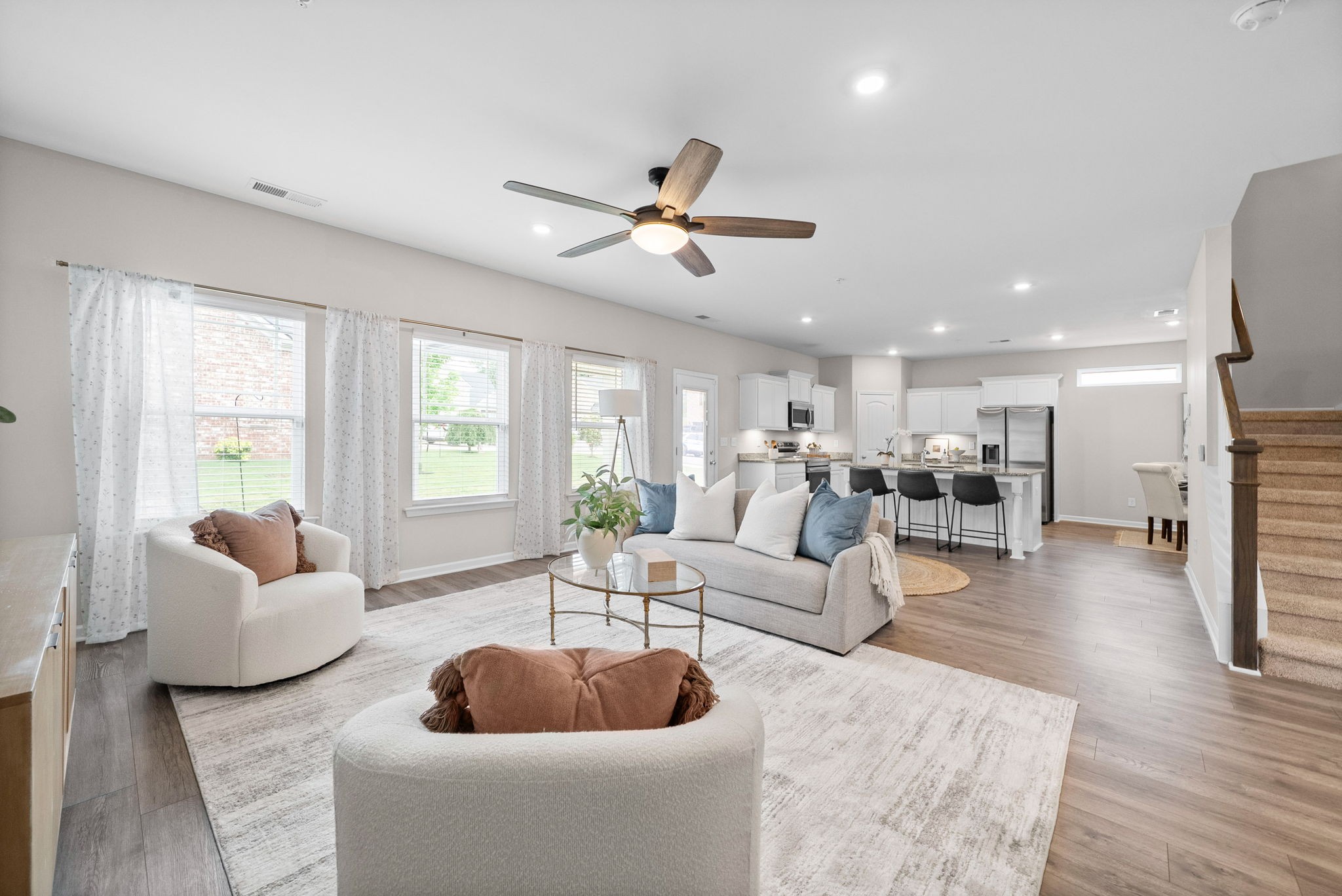 719 Reflections Lane Pleasant View, TN 37146 - Photo 11 of 46 a living room with furniture and a large window