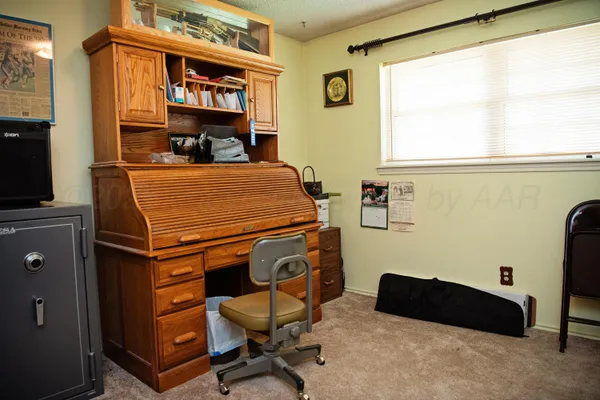 a room with furniture and a flat screen tv