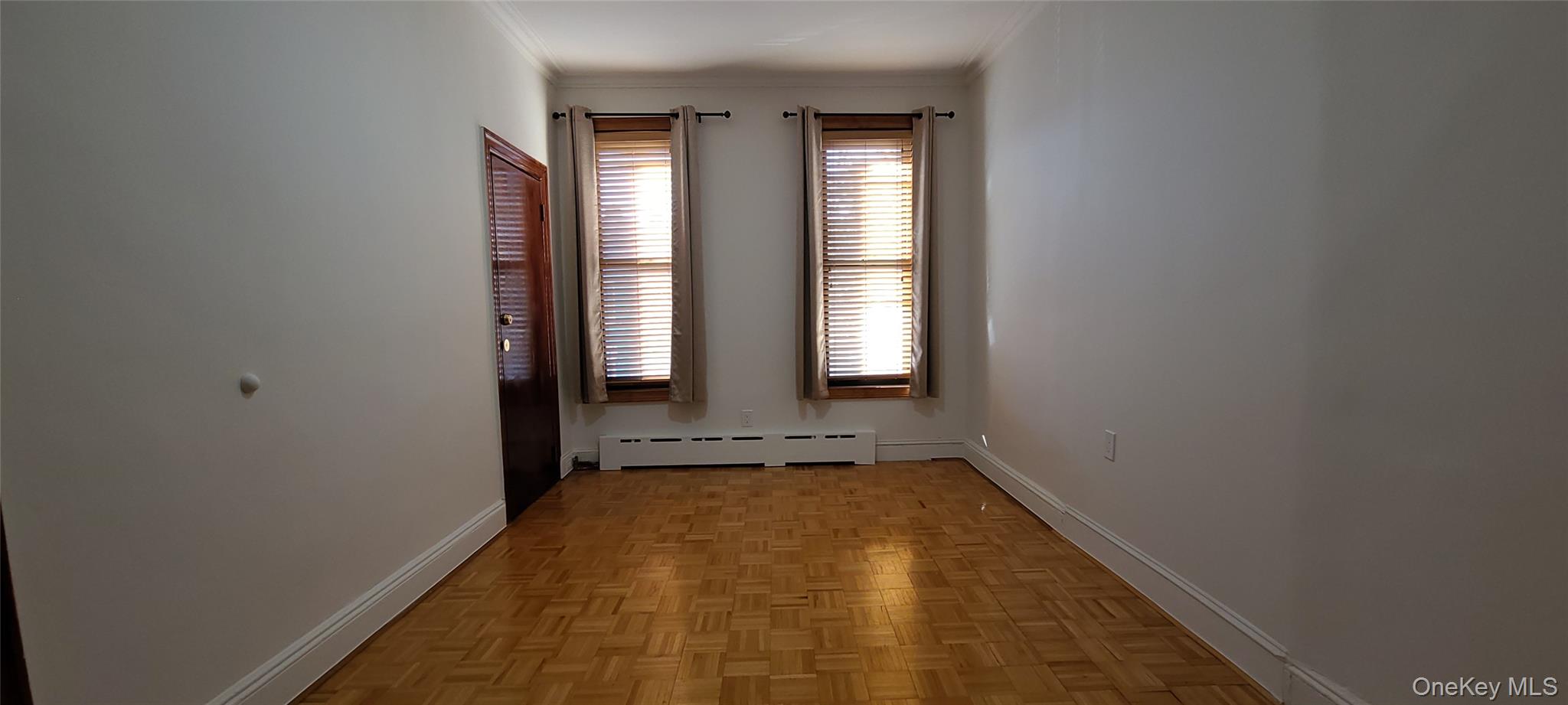 149 A 31st Street, Unit 2 Brooklyn, NY 11232 - Photo 6 of 8 a view of an empty room with window