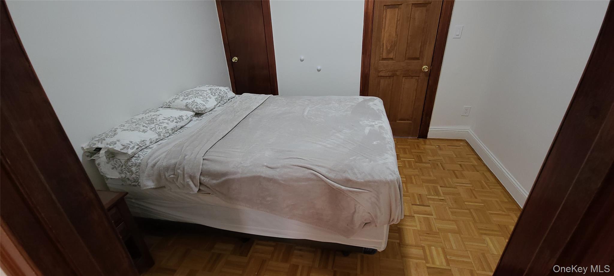 149 A 31st Street, Unit 2 Brooklyn, NY 11232 - Photo 7 of 8 a bathroom with a sink and a mirror