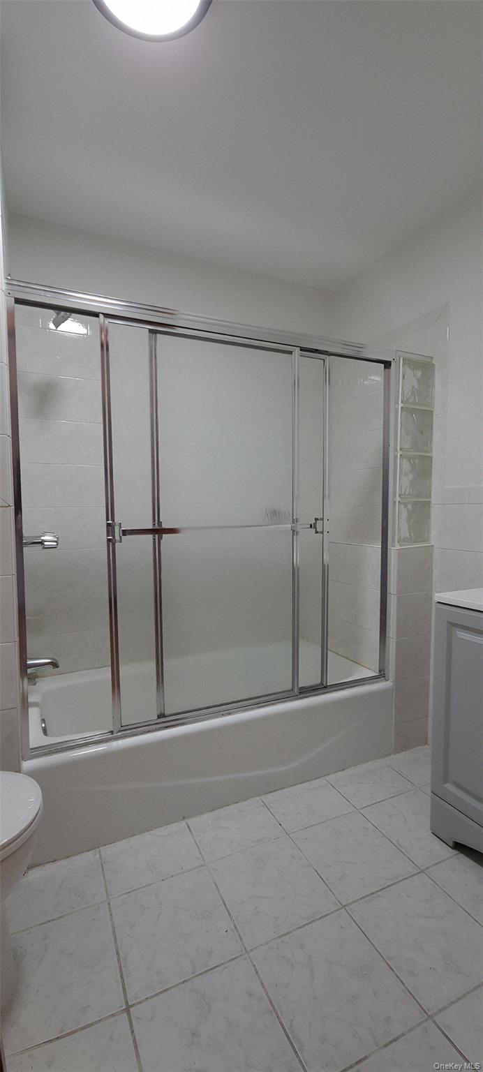 149 A 31st Street, Unit 2 Brooklyn, NY 11232 - Photo 8 of 8 a bathroom with a shower