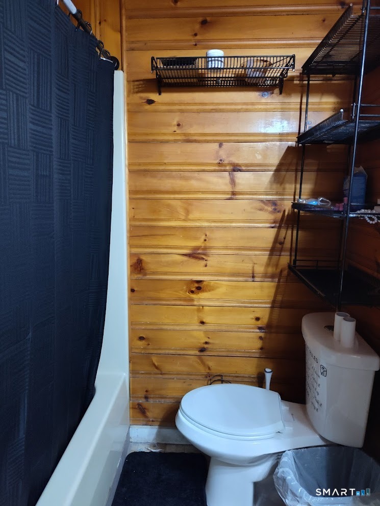 13 Rose Street Norwich, CT 06360 - Photo 5 of 21 a bathroom with a toilet and a shower