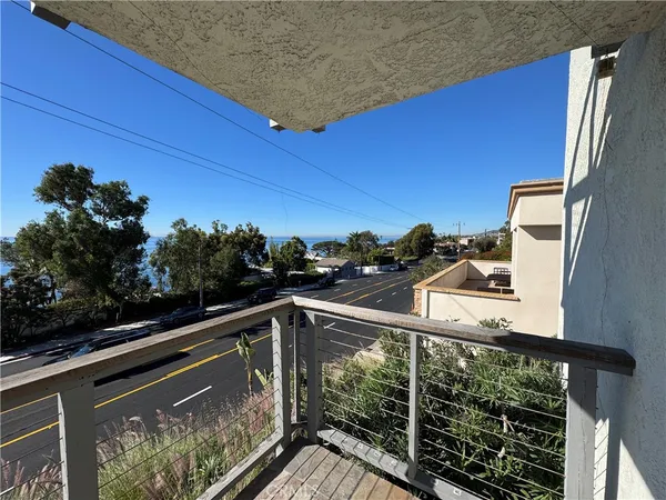 a view of balcony with two flat screen tv