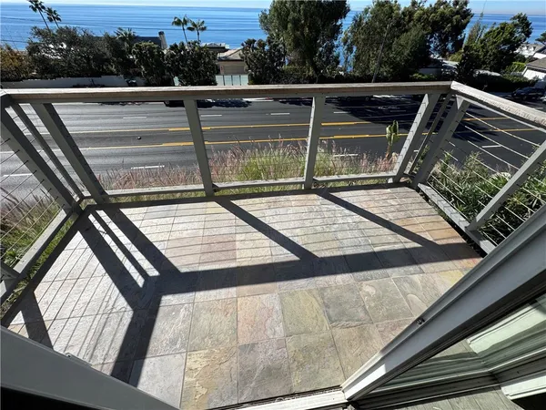 a kitchen with stainless steel appliances a stove microwave and sink