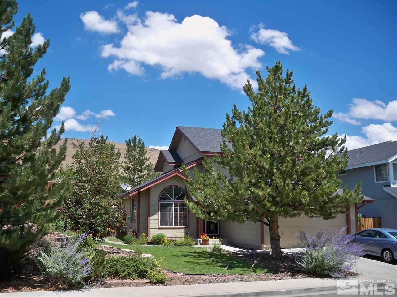 3951 Regal Drive Reno, NV 89503 - Photo 1 of 1 a front view of a house with a yard