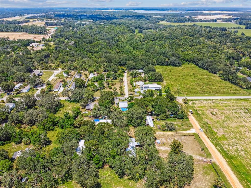 1101 Bird Road Davenport, FL 33837 - Photo 13 of 36 a view of a lake with a mountain