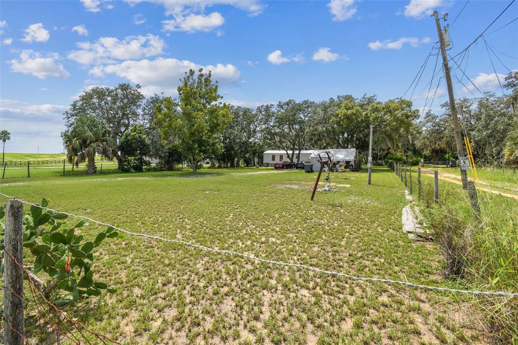 1101 Bird Road Davenport, FL 33837 - Photo 17 of 36 a view of a golf course