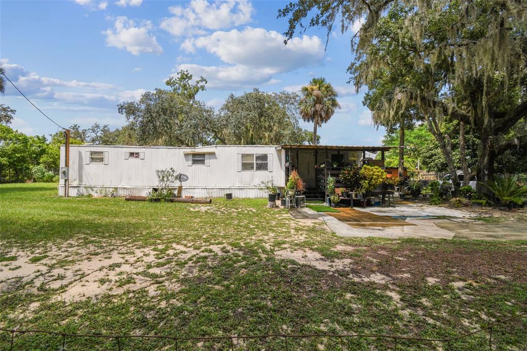 1101 Bird Road Davenport, FL 33837 - Photo 25 of 36 a view of backyard of the house