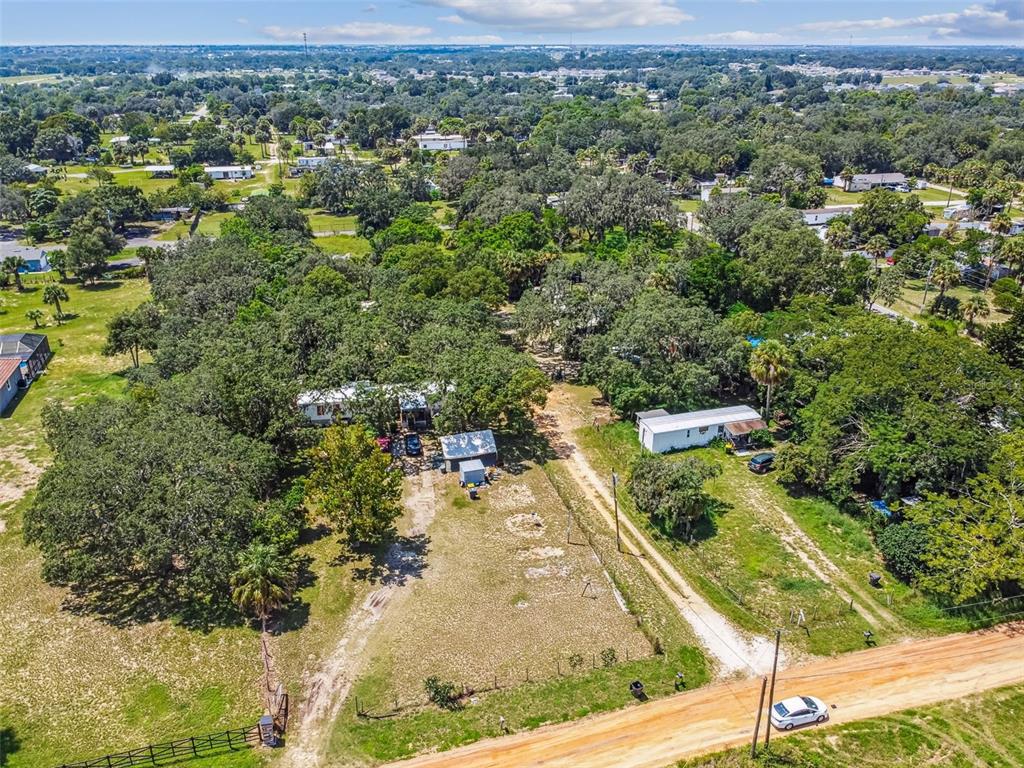 1101 Bird Road Davenport, FL 33837 - Photo 6 of 36 an aerial view of residential houses with outdoor space