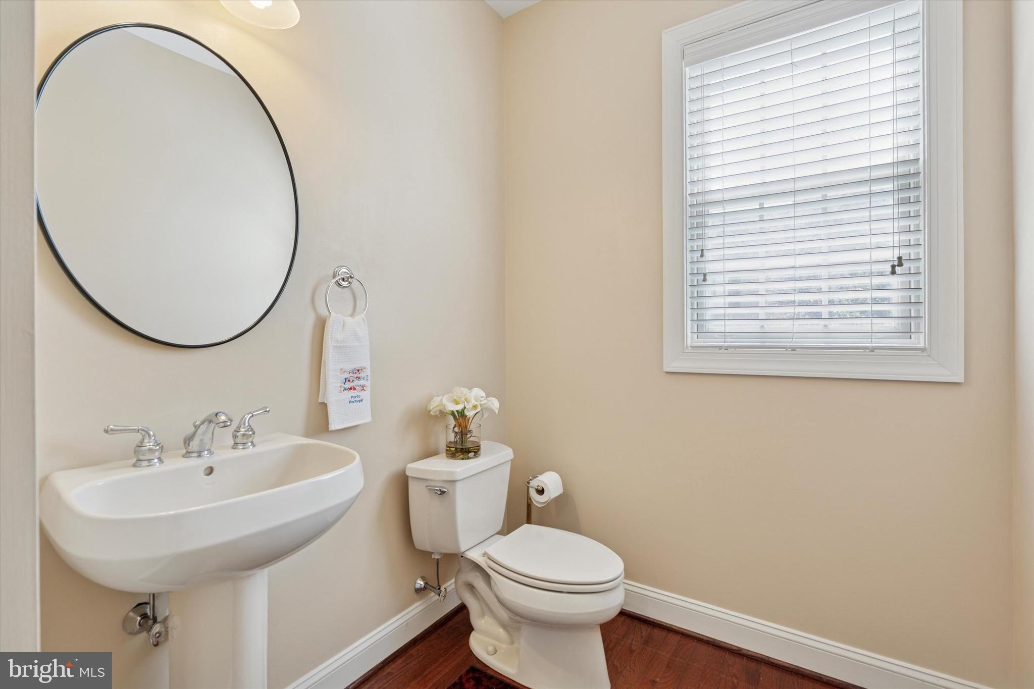 1375 Sloan Way Ambler, PA 19002 - Photo 11 of 54 a bathroom with a sink a toilet and a mirror