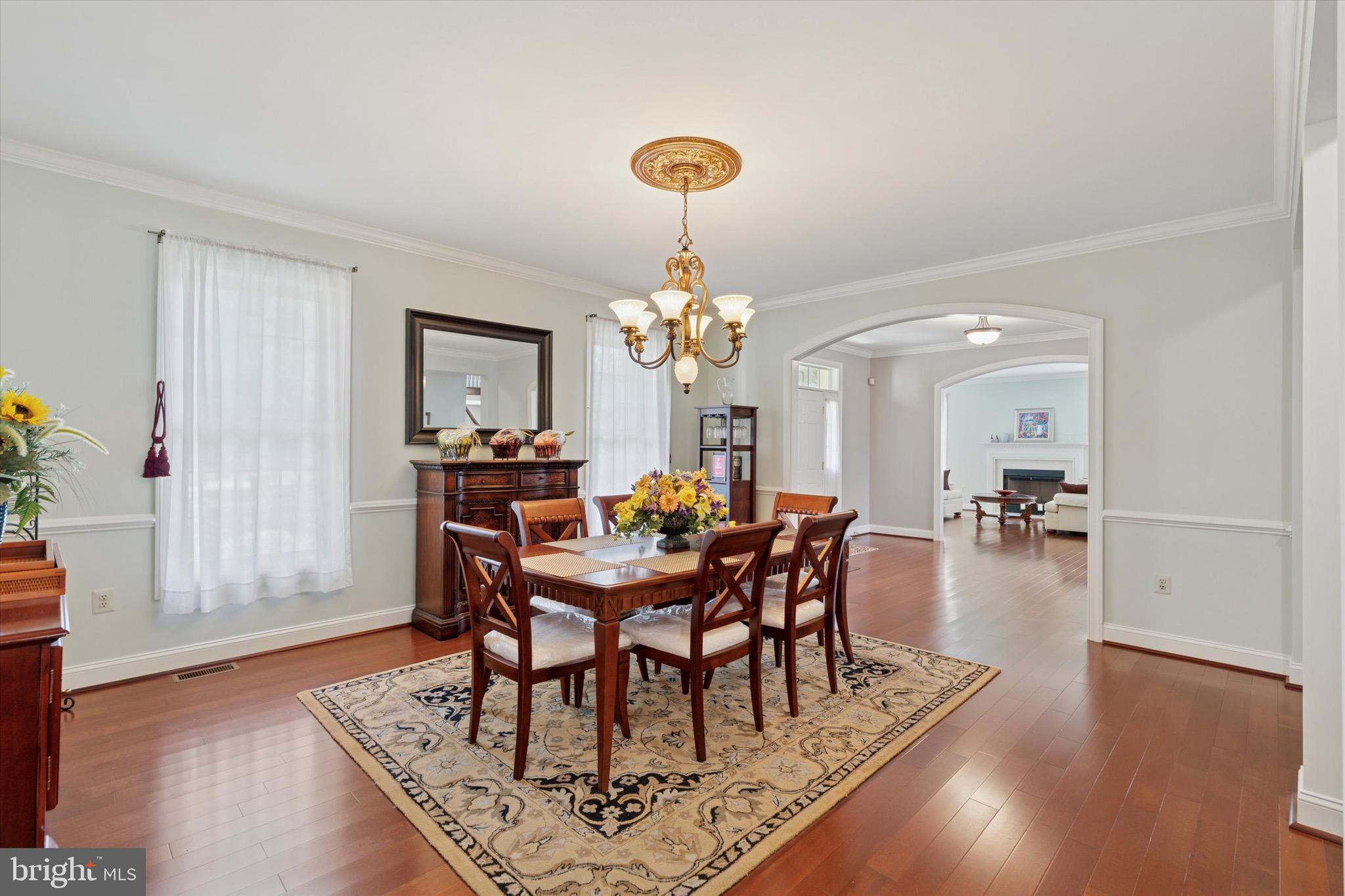 1375 Sloan Way Ambler, PA 19002 - Photo 13 of 54 a view of a dining room with furniture and wooden floor