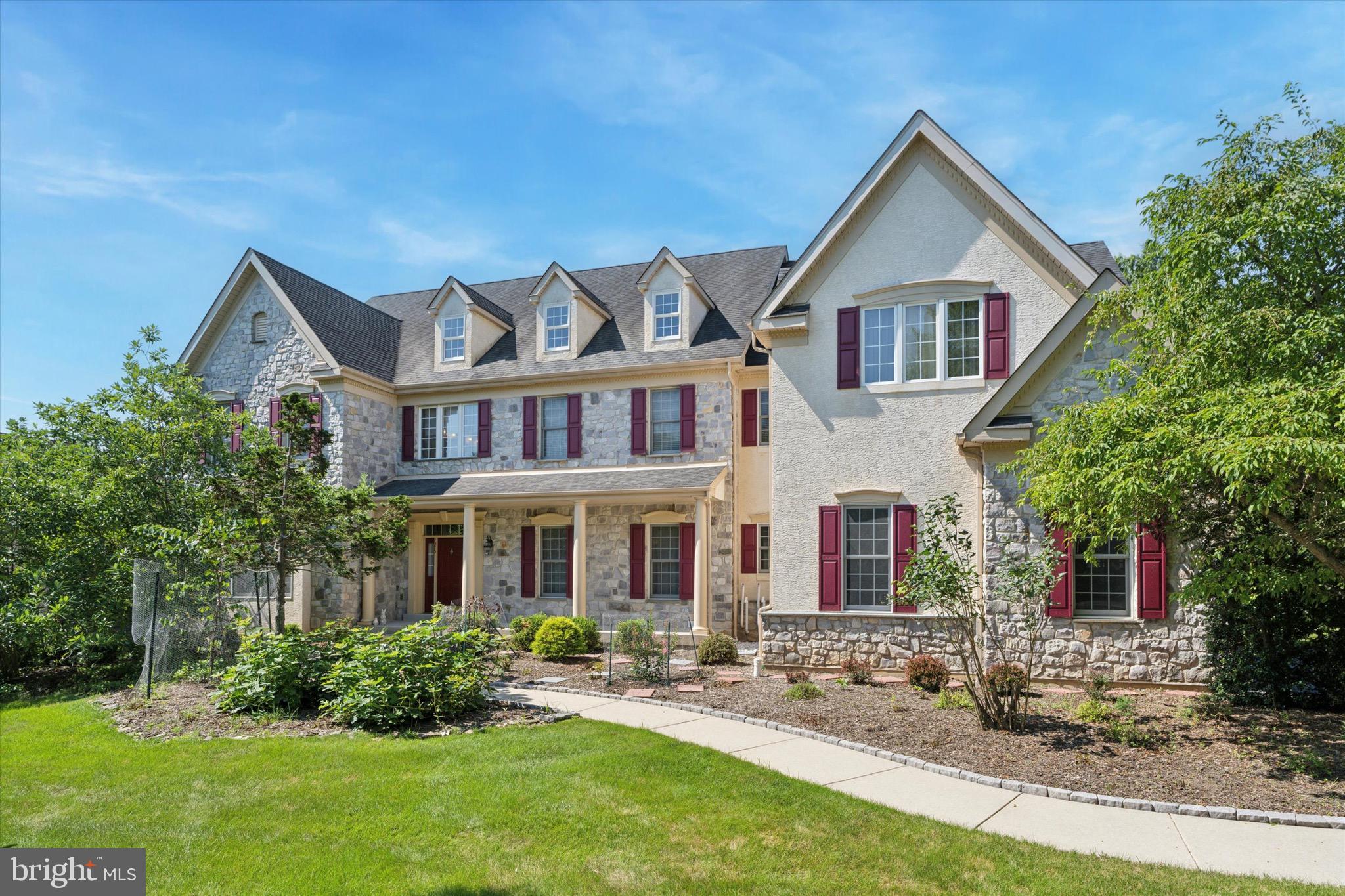 1375 Sloan Way Ambler, PA 19002 - Photo 2 of 54 a front view of a house with a yard