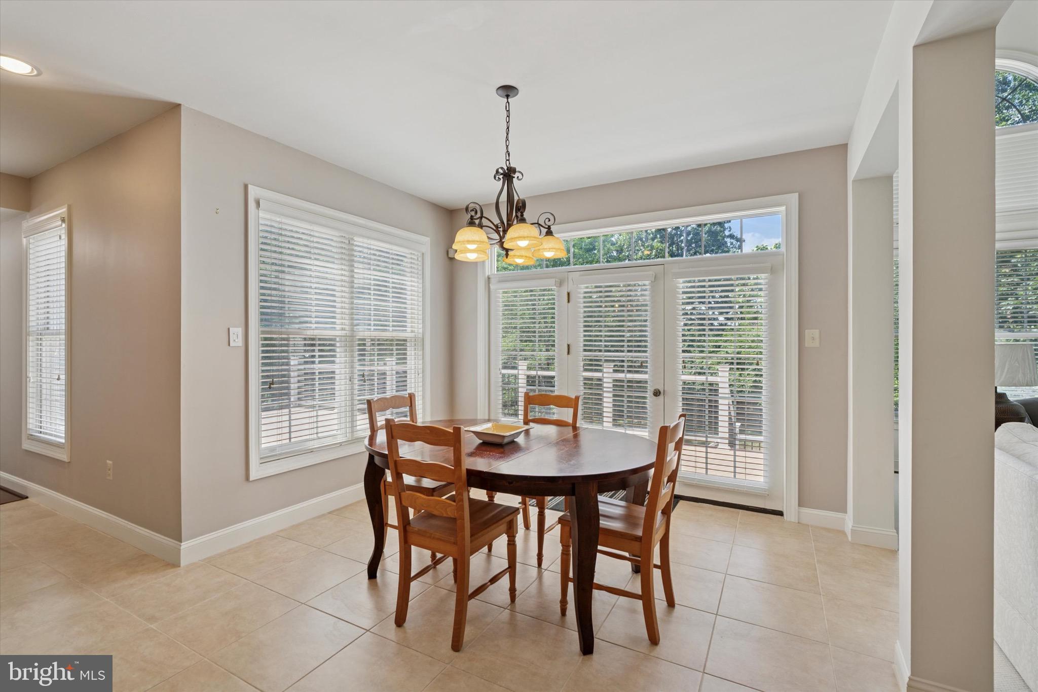 1375 Sloan Way Ambler, PA 19002 - Photo 21 of 54 a dining room with furniture window and chandelier