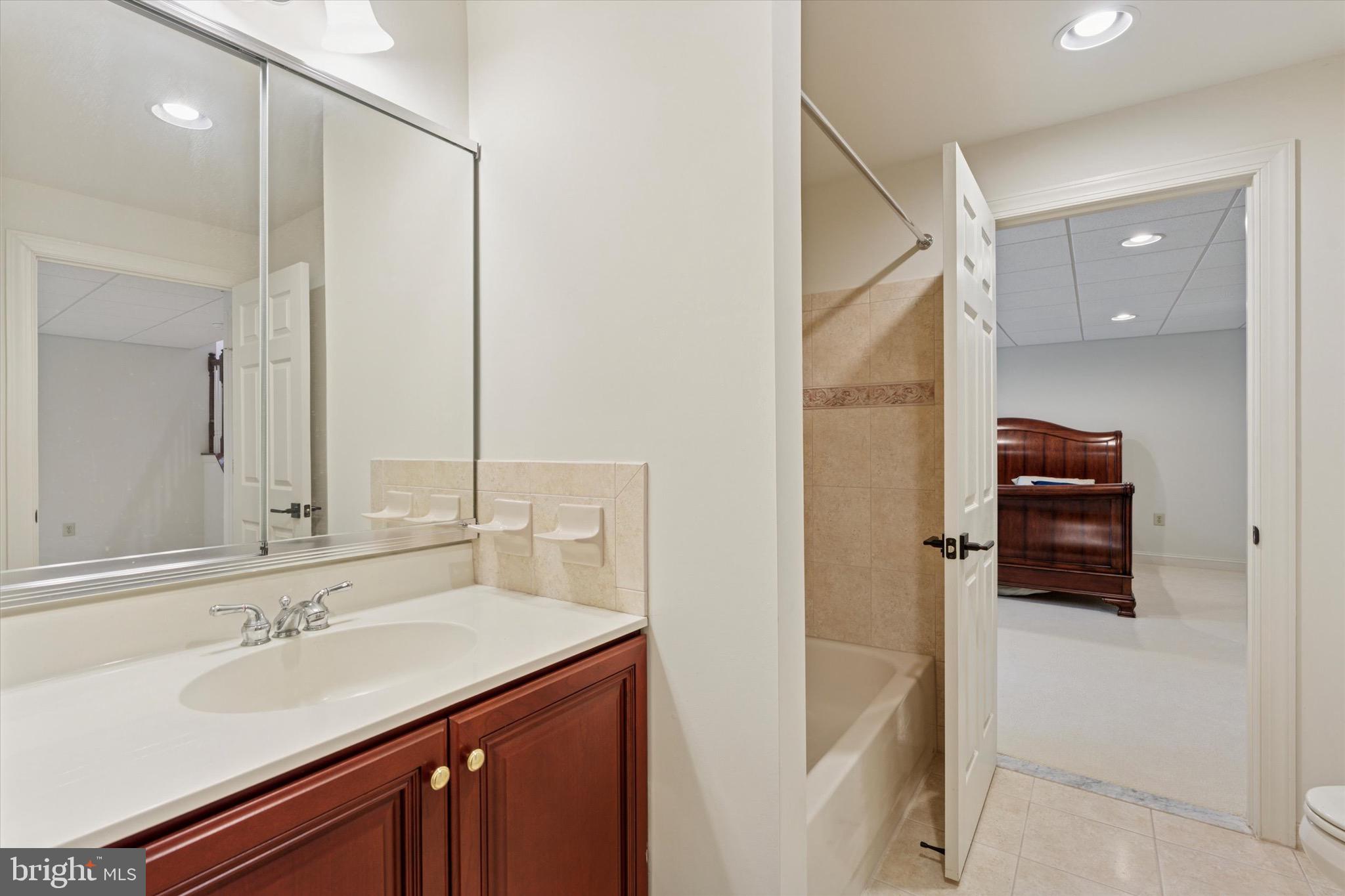 1375 Sloan Way Ambler, PA 19002 - Photo 30 of 54 a bathroom with a sink and a mirror
