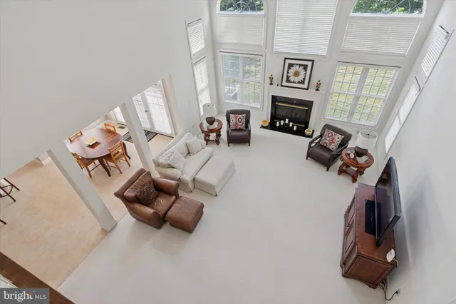 a bedroom with a bed and a chair