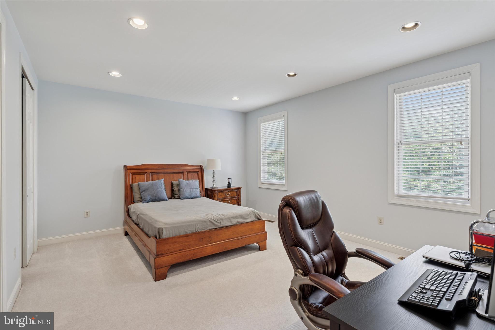 1375 Sloan Way Ambler, PA 19002 - Photo 34 of 54 a bedroom with a bed and a chair