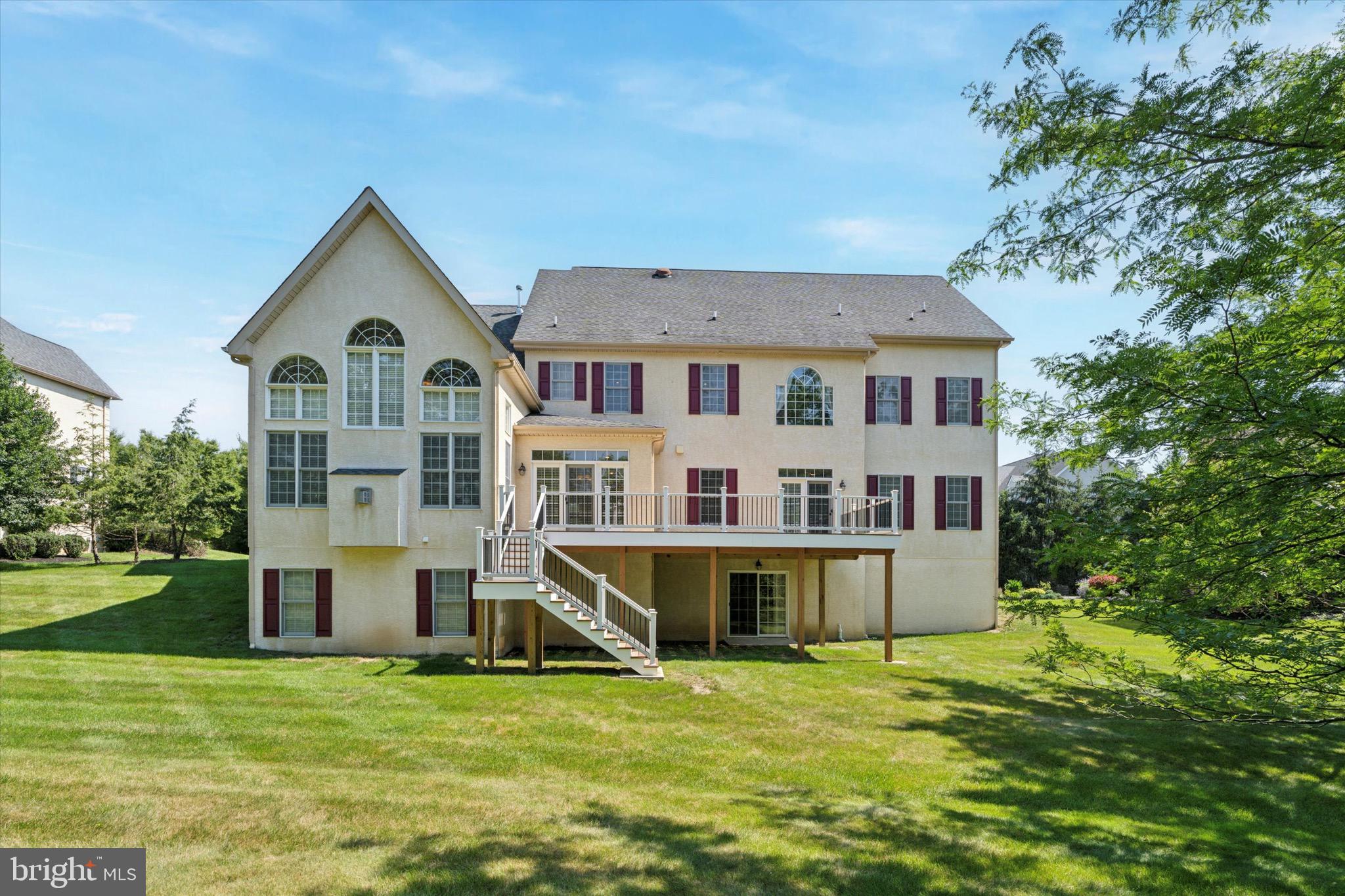 1375 Sloan Way Ambler, PA 19002 - Photo 49 of 54 a view of a house with a big yard and large trees