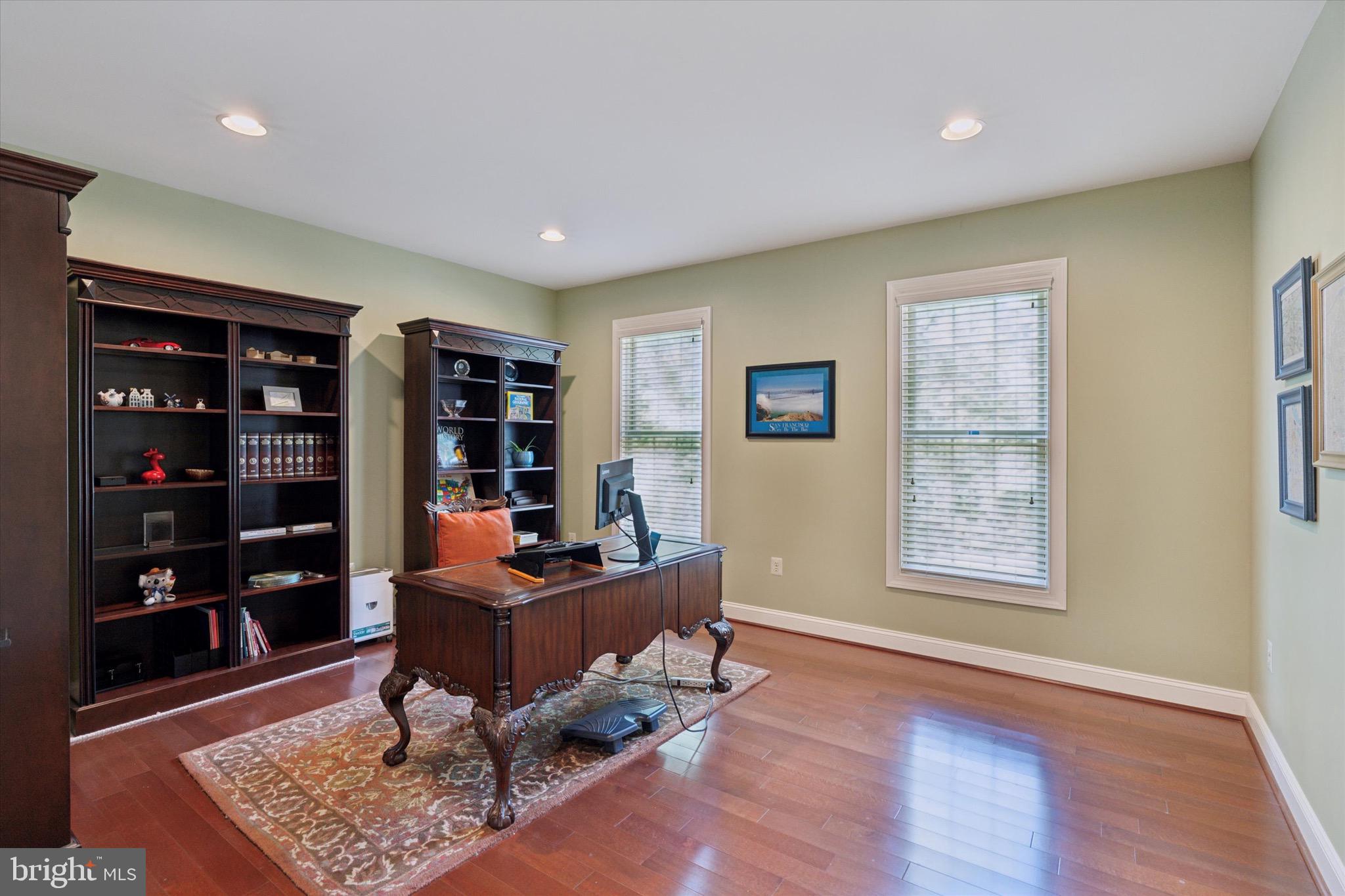 1375 Sloan Way Ambler, PA 19002 - Photo 10 of 54 a room with furniture a bookshelf and a window