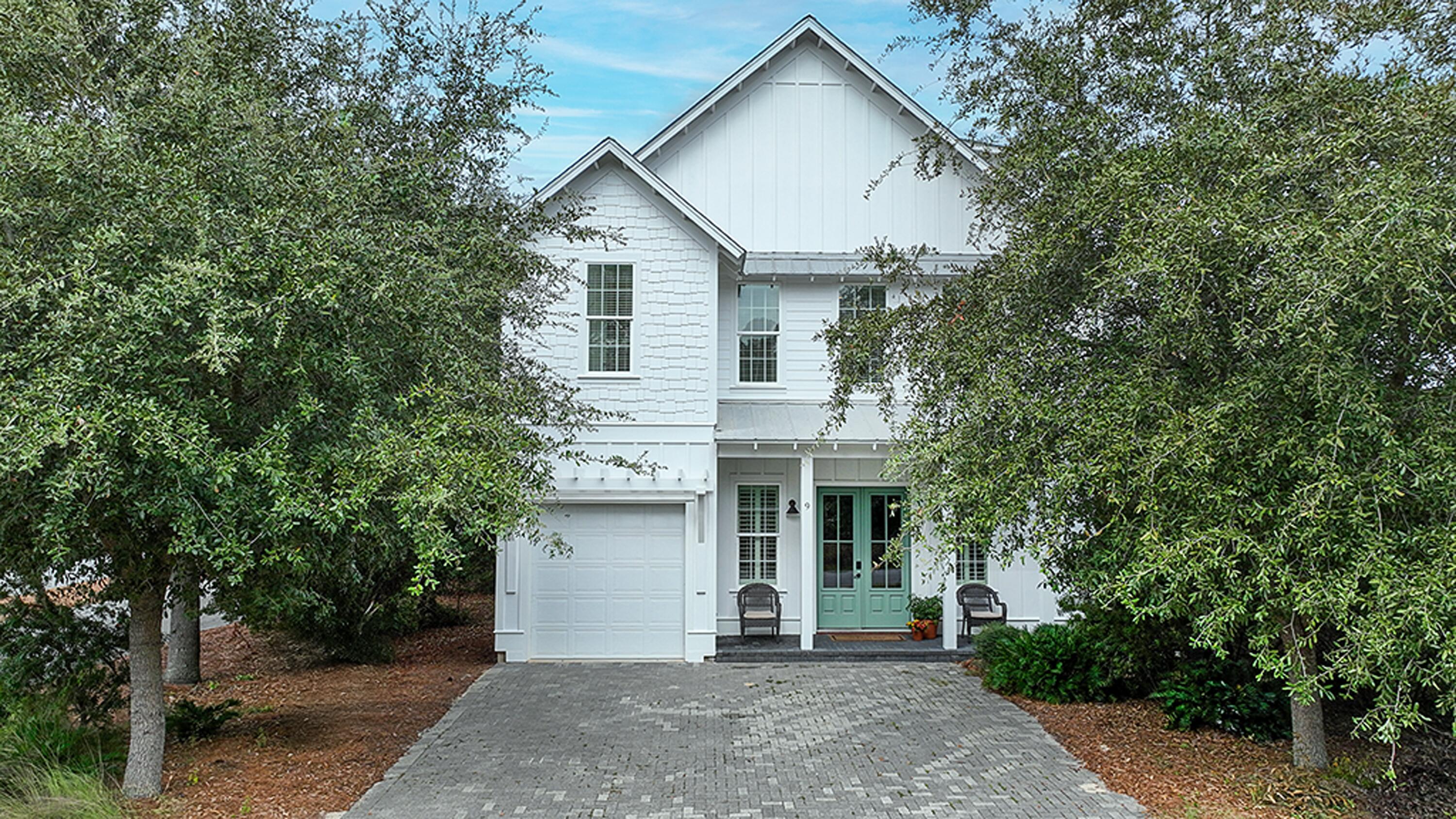 9 Willow Mist Road Inlet Beach, FL 32461 - Photo 1 of 52 a front view of a house with a garden
