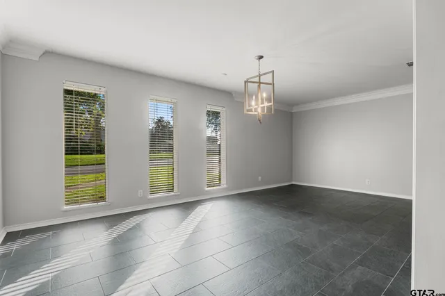 an empty room with windows