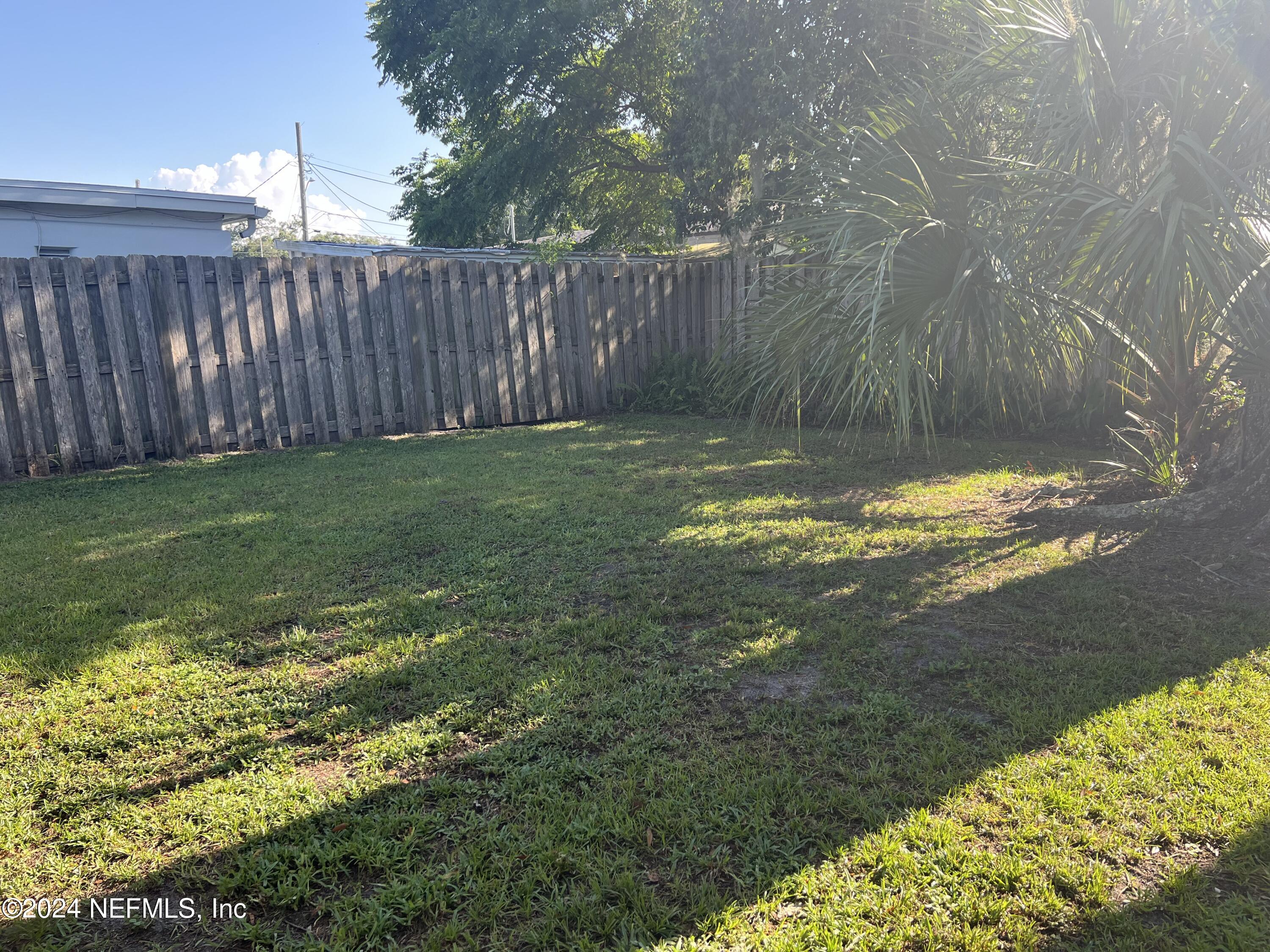 6115 Stetson Road Jacksonville, FL 32217 - Photo 17 of 25 a view of yard with wooden fence