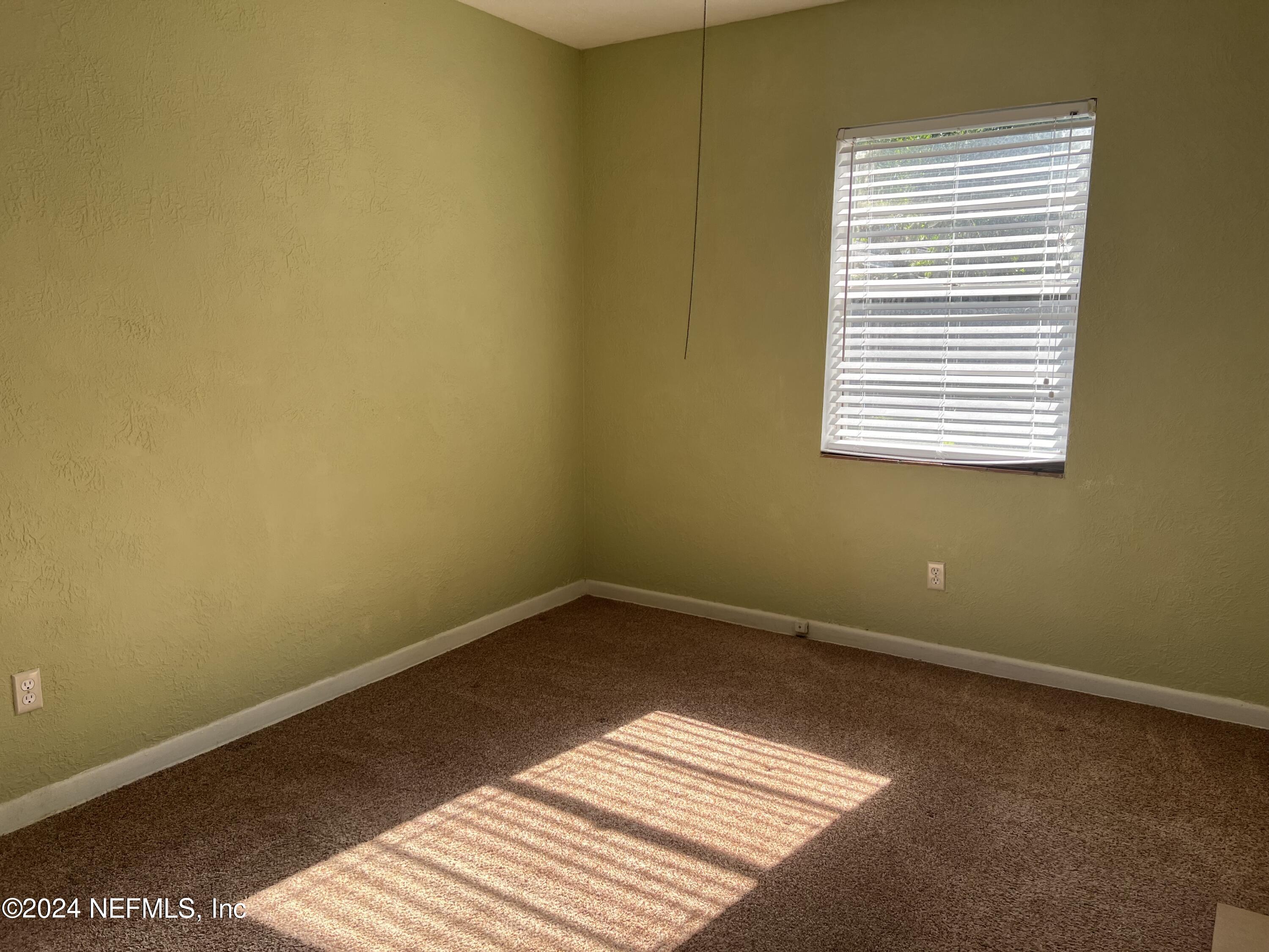 6115 Stetson Road Jacksonville, FL 32217 - Photo 8 of 25 a view of a small space with a window
