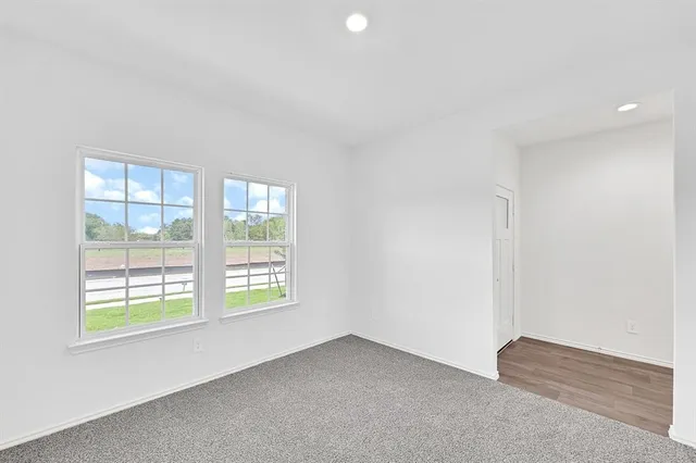 an empty room with windows