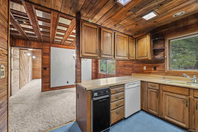a bathroom with a sink a toilet and bathtub