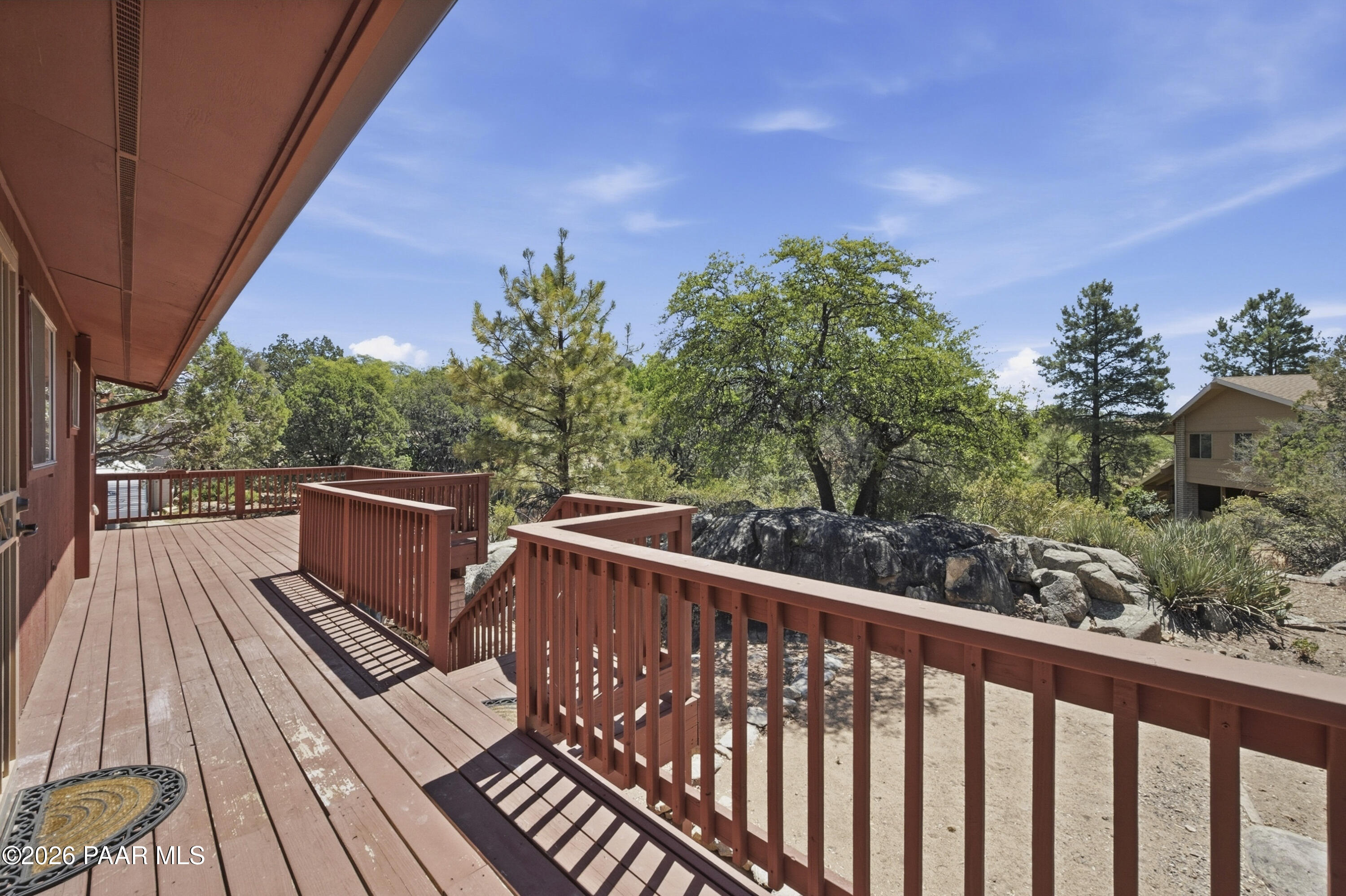 1775 Grandview Road Prescott, AZ 86305 - Photo 38 of 42 a view of a balcony with wooden floor and fence