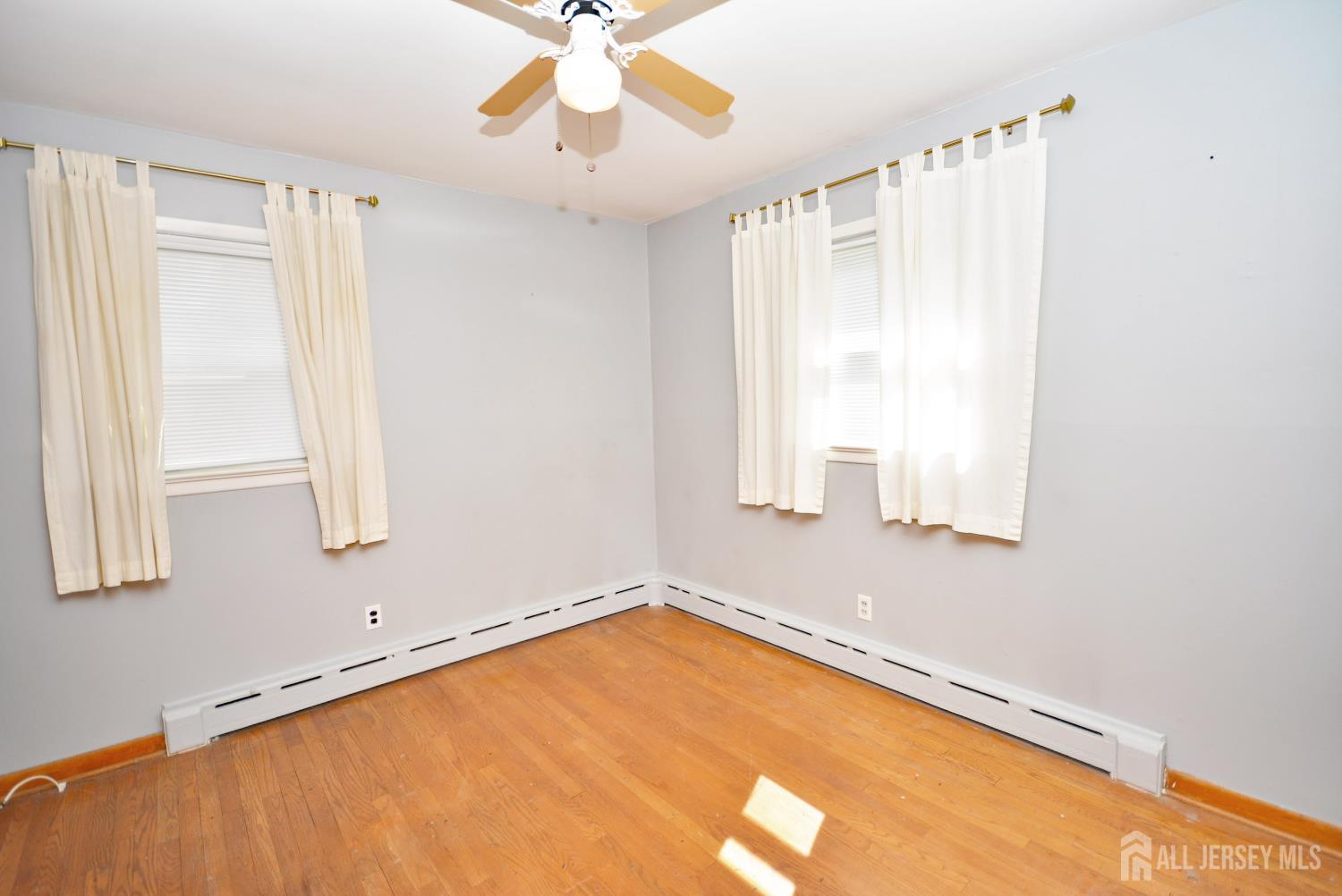 9 Emma Place Middlesex, NJ 08846 - Photo 14 of 32 a view of a room with window and ceiling fan