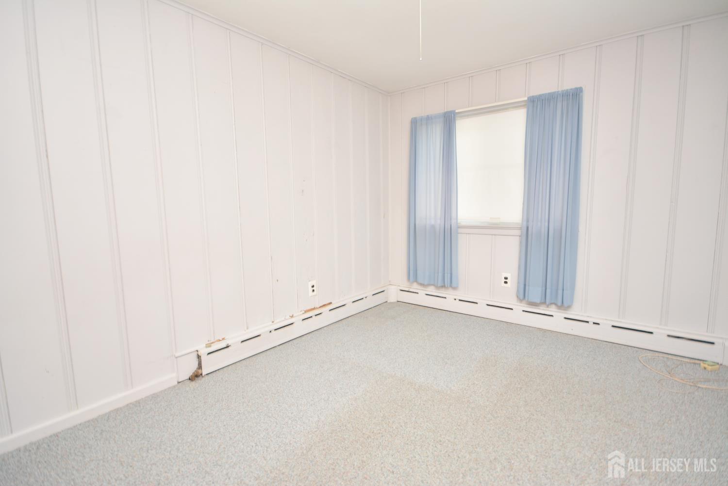 9 Emma Place Middlesex, NJ 08846 - Photo 16 of 32 an empty room with a window