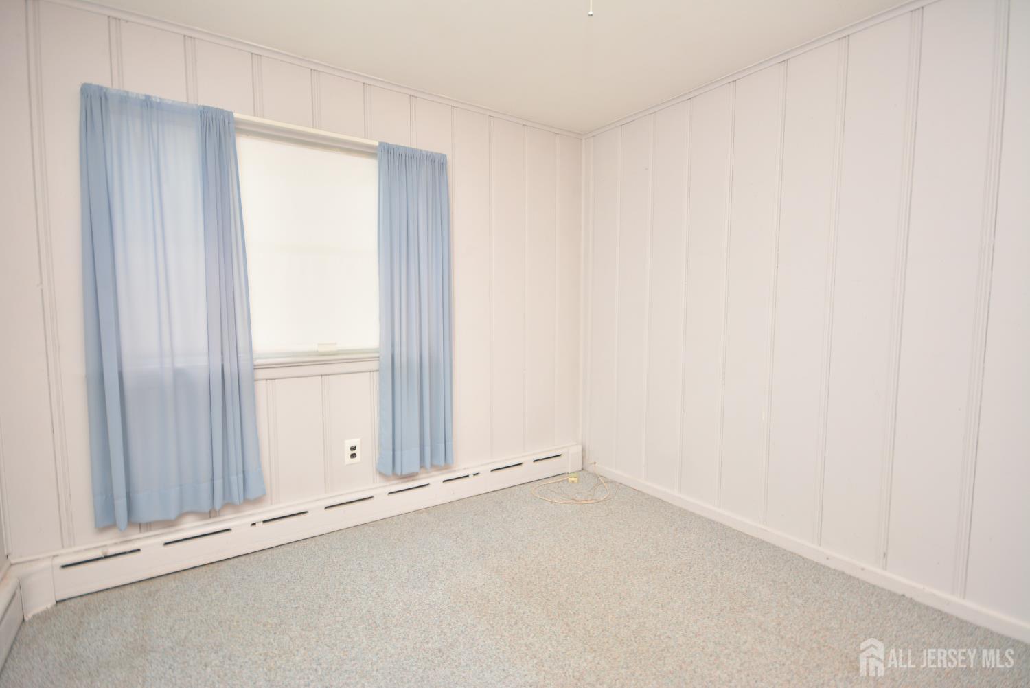 9 Emma Place Middlesex, NJ 08846 - Photo 17 of 32 an empty room with window