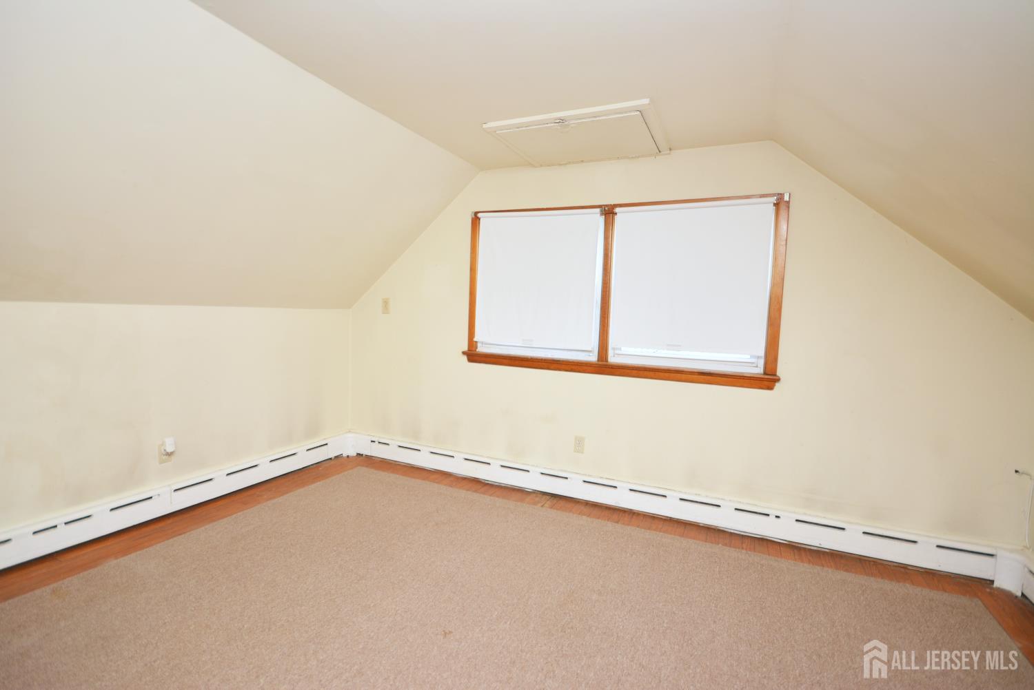 9 Emma Place Middlesex, NJ 08846 - Photo 21 of 32 an empty room with a window