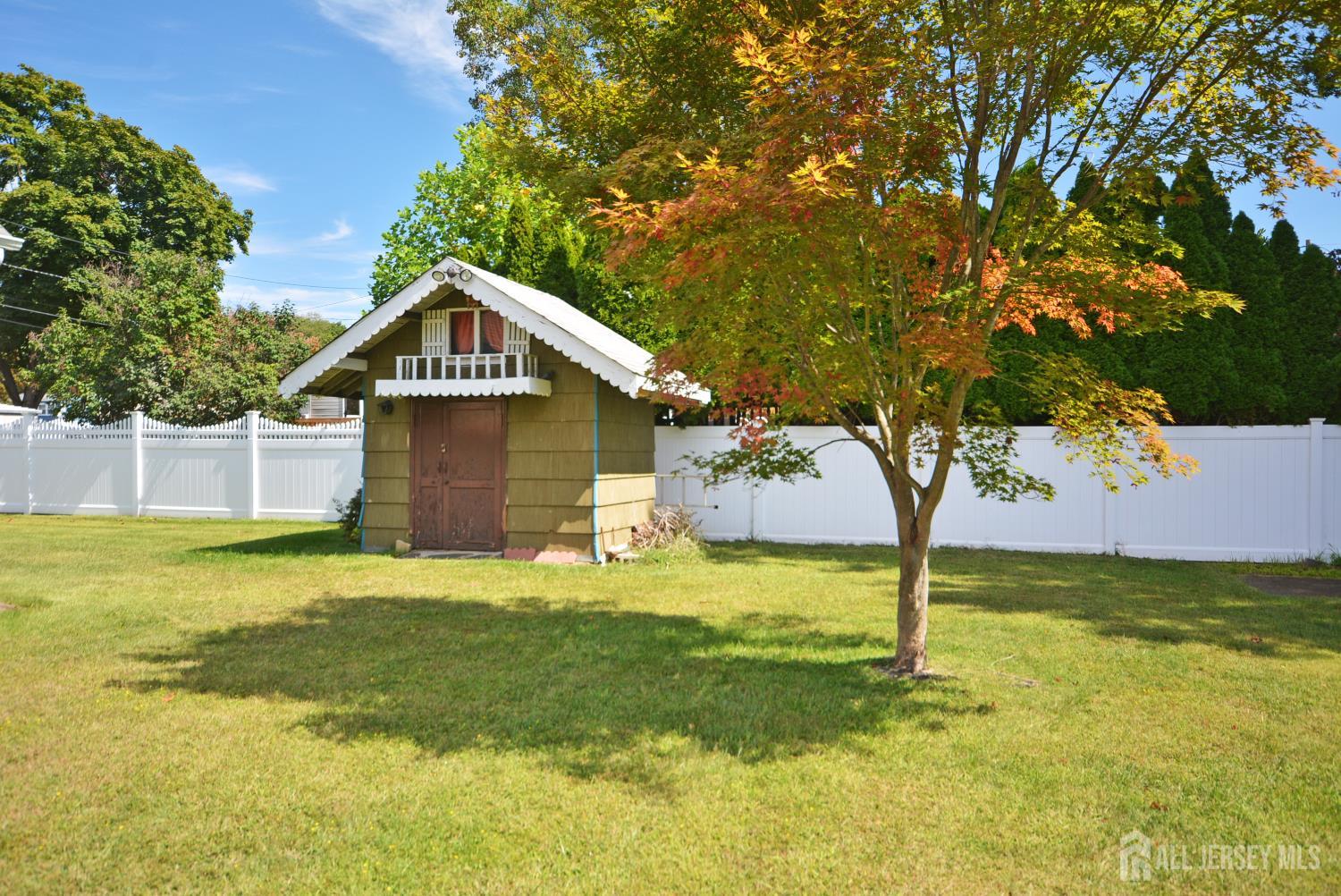9 Emma Place Middlesex, NJ 08846 - Photo 29 of 32 a front view of a house with a yard