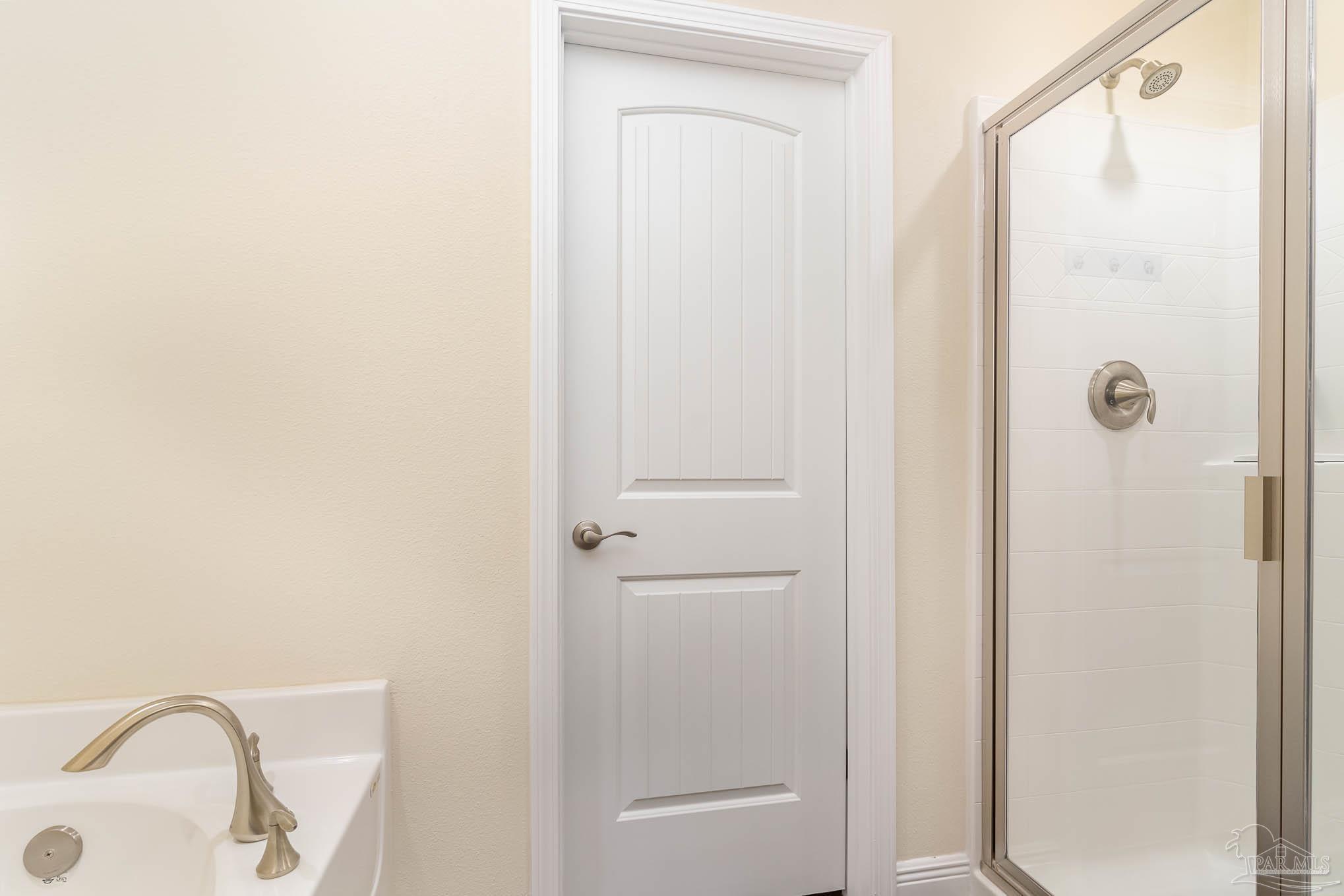 3315 Doyle Hawkins Road Navarre, FL 32566 - Photo 16 of 33 a bathroom with a shower