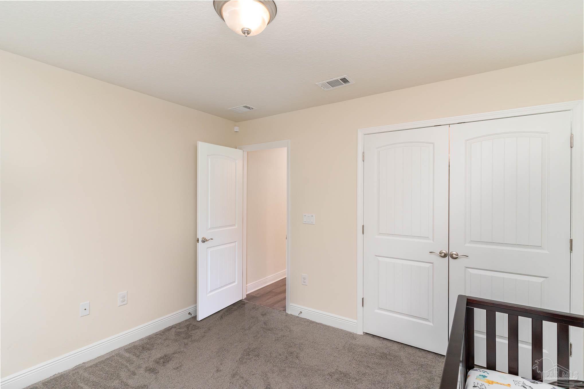 3315 Doyle Hawkins Road Navarre, FL 32566 - Photo 22 of 33 a view of an empty room