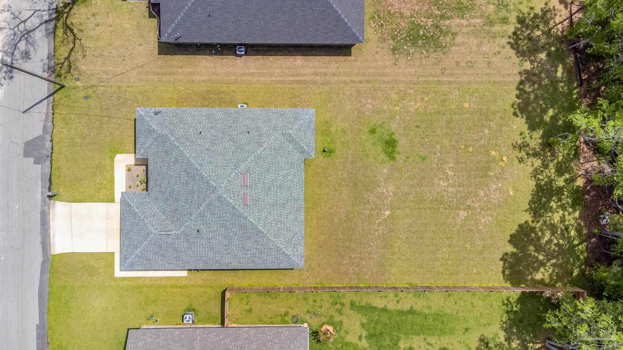 3315 Doyle Hawkins Road Navarre, FL 32566 - Photo 33 of 33 a bathroom with a sink and a mirror