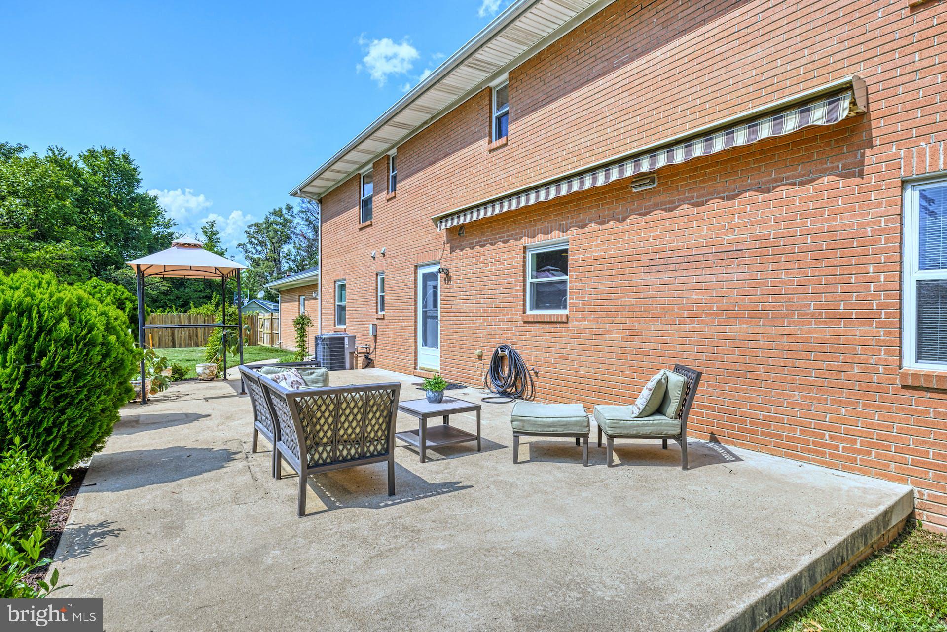 7716 Fordson Road Alexandria, VA 22306 - Photo 35 of 48 Patio has retractable awning
