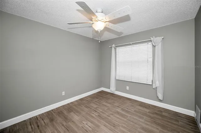 a house view with a backyard space