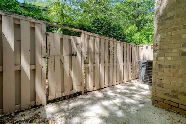 a view of a wooden fence