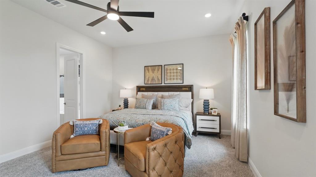 1016 Pitchfork Road Royse City, TX 75189 - Photo 17 of 35 a bedroom with a bed and a couch