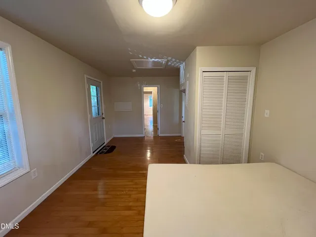a view of a storage & utility room with a window