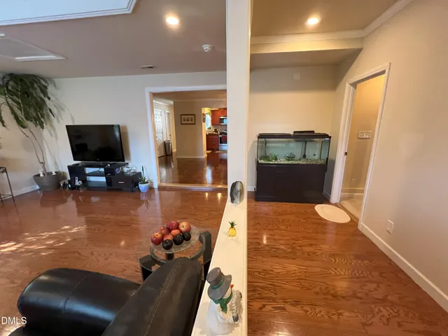 a room with furniture and a flat screen tv