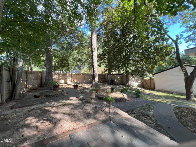 an outdoor space with patio area and outdoor seating