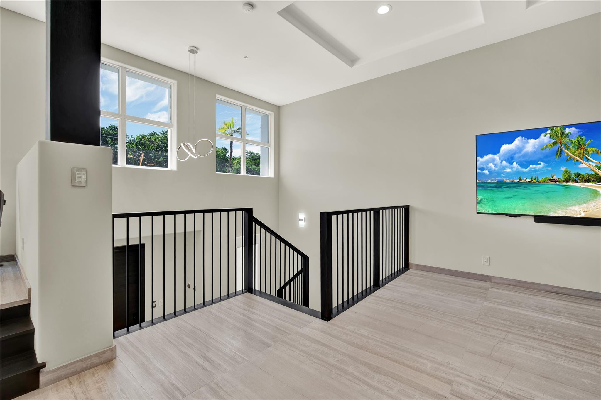 425 North Ocean Boulevard, Unit 3 Boca Raton, FL 33432 - Photo 17 of 69 a view of a hallway with wooden floor and windows