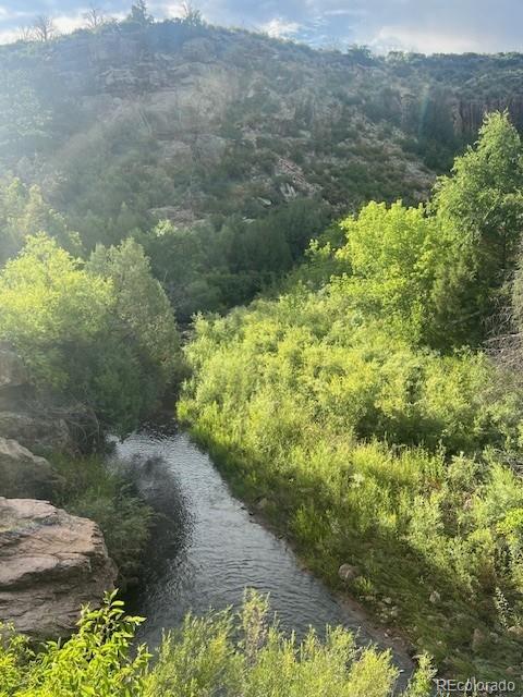 Simonson Road Beulah, CO 81023 - Photo 6 of 31 a view of a lake with a yard