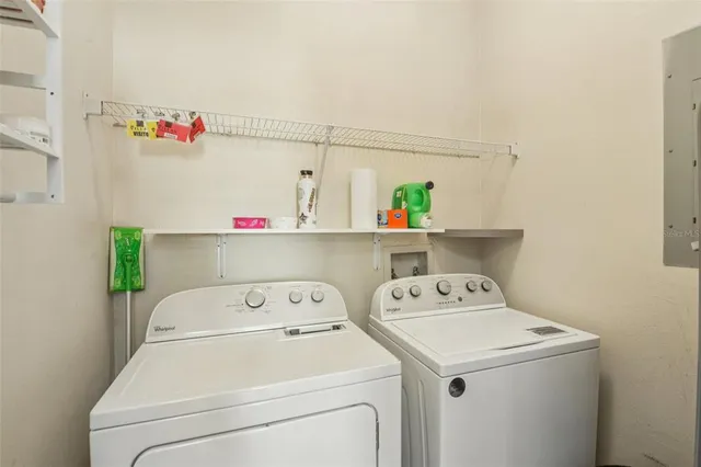 a utility room with dryer and washer
